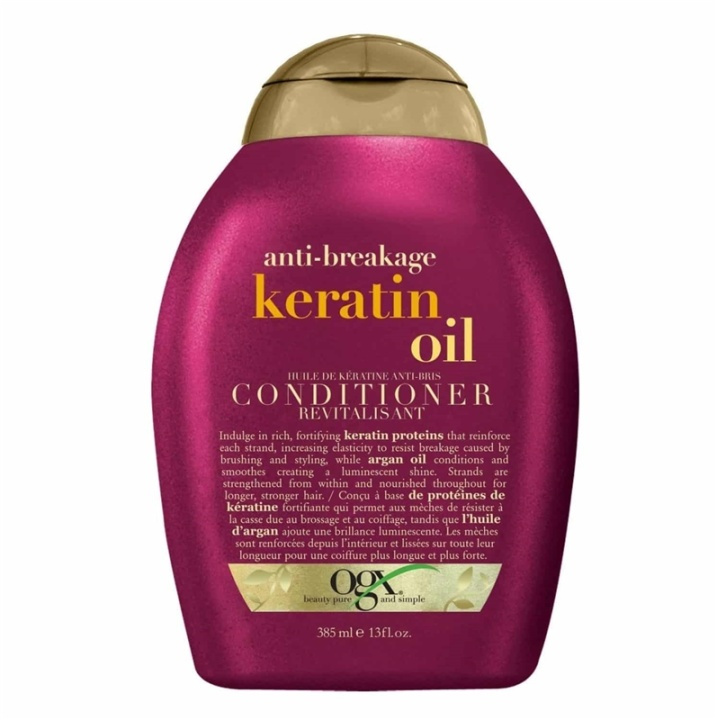 OGX Anti Breakage Keratin Oil Conditioner 385ml ryhmässä KAUNEUS JA TERVEYS / Hiukset &Stailaus / Hiustenhoito / Hoitoaine @ TP E-commerce Nordic AB (A12603)