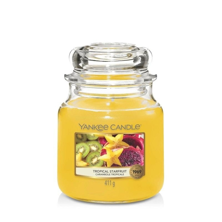 Yankee Candle Classic Medium Jar Tropical Starfruit 411g ryhmässä KAUNEUS JA TERVEYS / Tuoksut & Parfyymit / Muut tuoksut / Tuoksukynttilät @ TP E-commerce Nordic AB (C12948)