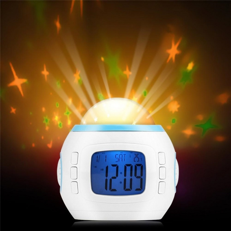 Herätyskello yövalolla ja musiikilla, tähdet