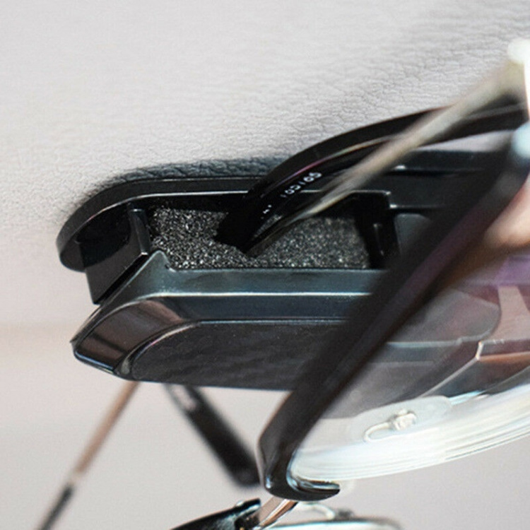 Kiinnike aurinkolaseille autoon, musta